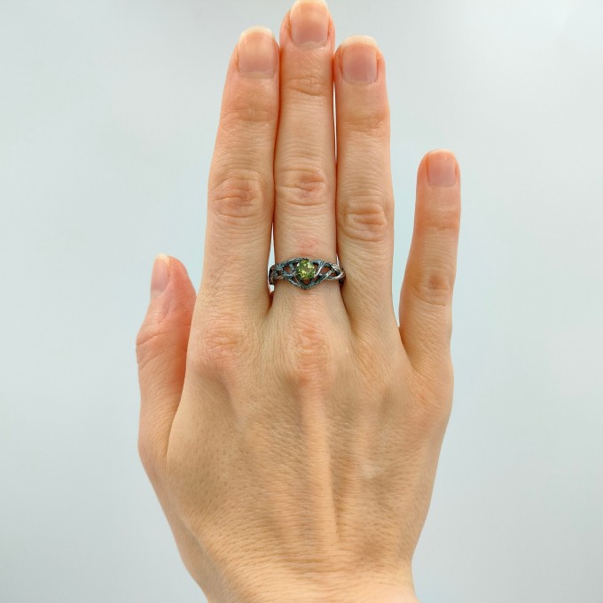 Enchanted Gothic Peridot Ring with Leaf Motif