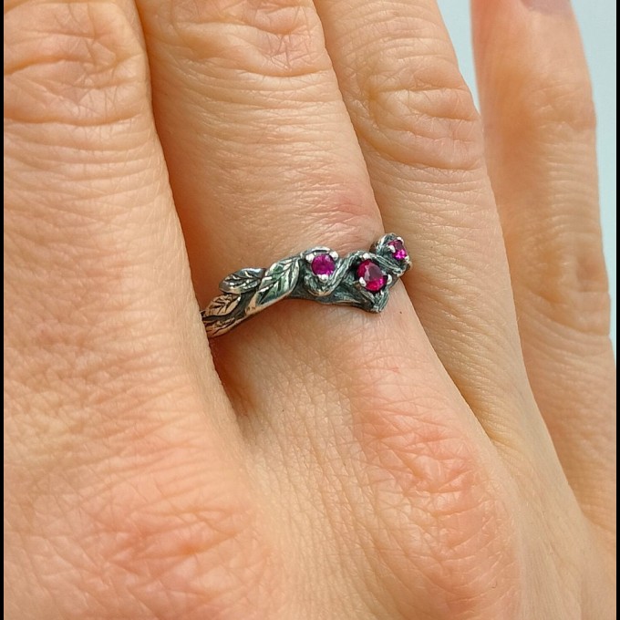 Gothic Ruby Ring with Intricate Twisting Design