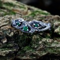 Gothic Silver Ring with Twisting Vines and Emerald Details