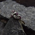 Garnet Gothic Skull Ring with Dark Intricacy