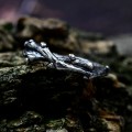 Elegant Silver Ring Inspired by Nature's Branches