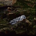 Delicate Silver Band with Intricate Weaving Design