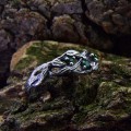 Silver Ring with Emeralds and Intricate Leaf Motif