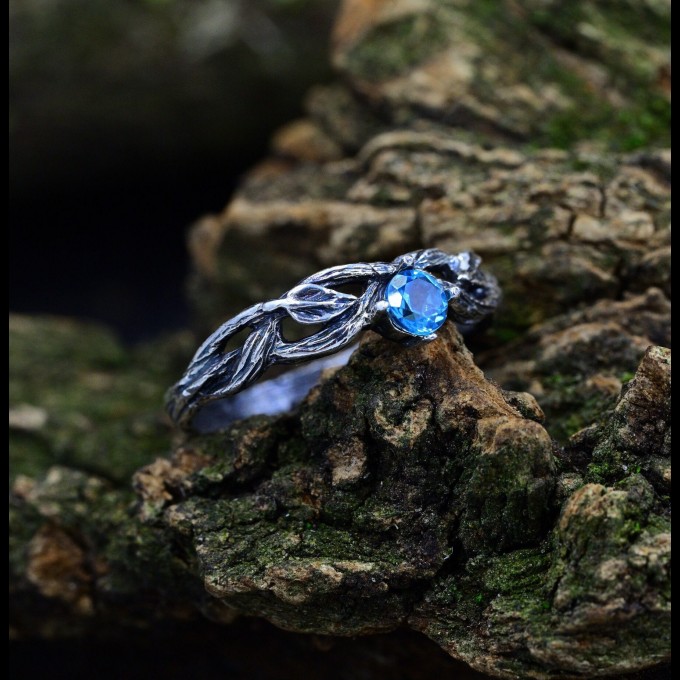 Ocean's Whisper: Gothic Sterling Silver Ring with Blue Topaz Gemstone