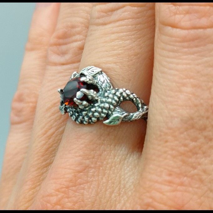 Silver Ring with Dragon Claw and Garnet Design