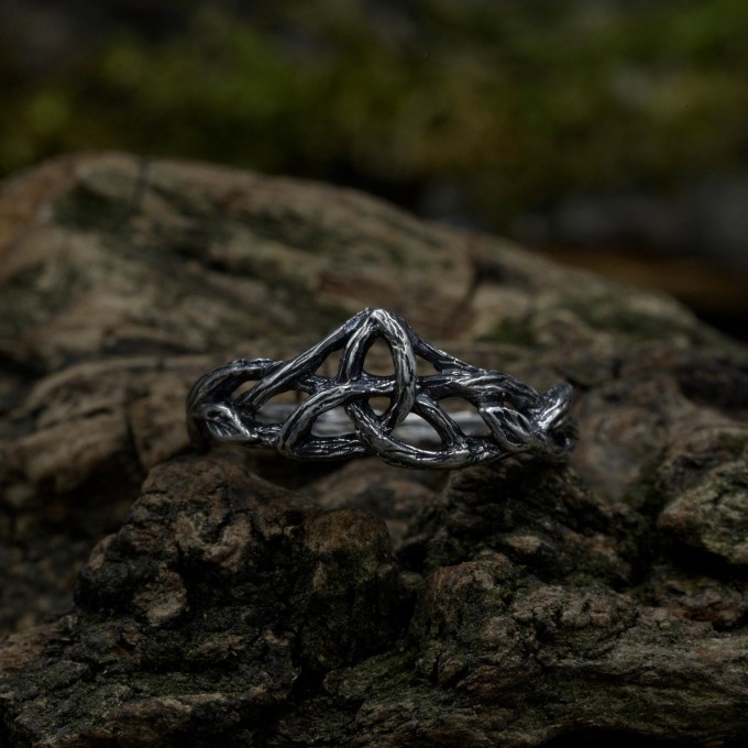 Gothic Blue Topaz Ring with Intricate Celtic Knot Motif