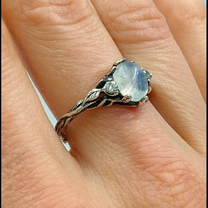 Celestial Bloom: Sterling Silver Ring with a Radiant Moonstone