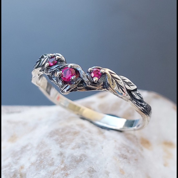 Gothic Ruby Ring with Intricate Twisting Design