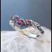 Gothic Ruby Ring with Intricate Twisting Design