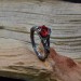 Gothic Garnet Ring with Intricate Flame Motif