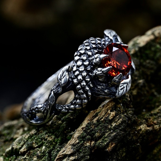 Silver Ring with Dragon Claw and Garnet Design