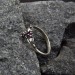 Gothic Silver Ring with Skull and Ruby Design