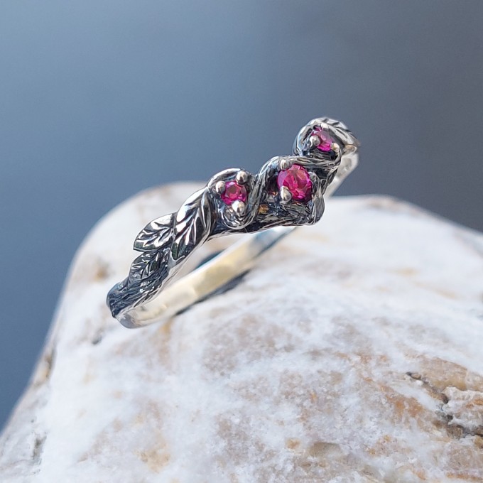 Gothic Ruby Ring with Intricate Twisting Design