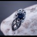 Intricate Silver Ring with Sapphire Gemstone