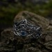 Gothic Blue Topaz Ring with Intricate Celtic Knot Motif