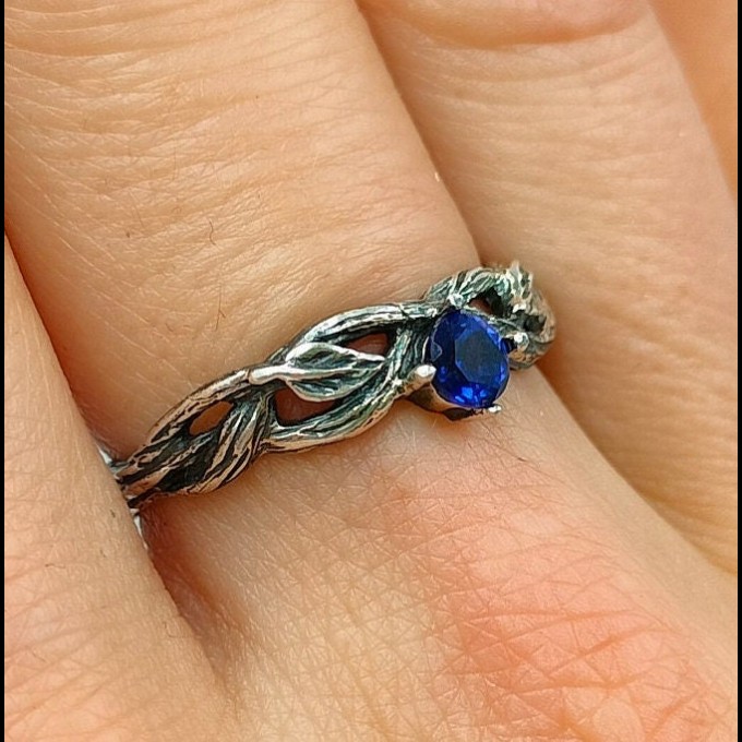 Nature-Inspired Peridot Silver Ring for Elegant Souls