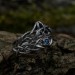 Gothic Blue Topaz Ring with Intricate Celtic Knot Motif