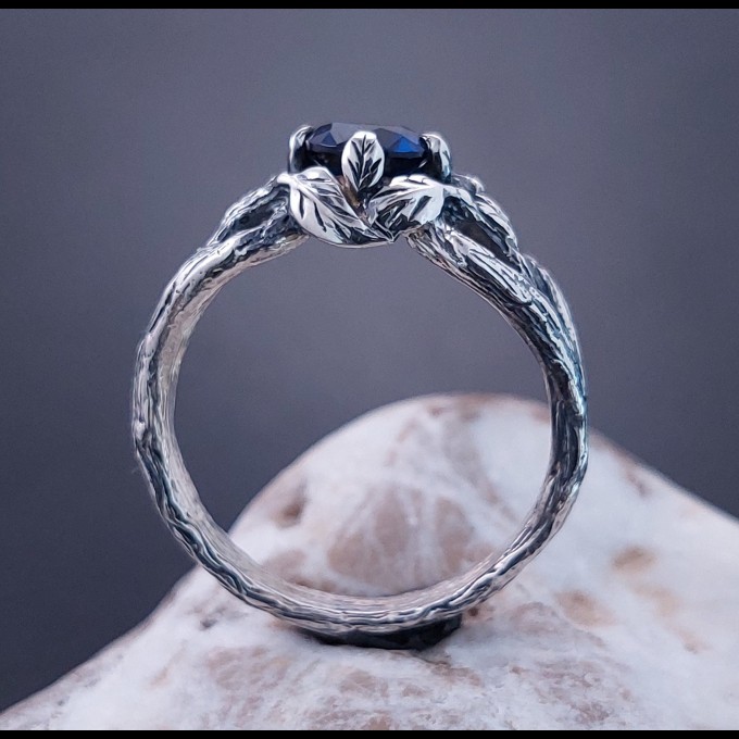 Intricate Silver Ring with Sapphire Gemstone