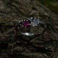 Delicate Gothic Ring with Ruby and Leaf Design