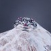 Skull of Destiny: Gothic Sterling Silver Ring with Fiery Garnets