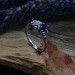 Silver Ring with Sapphire and Intricate Floral Design