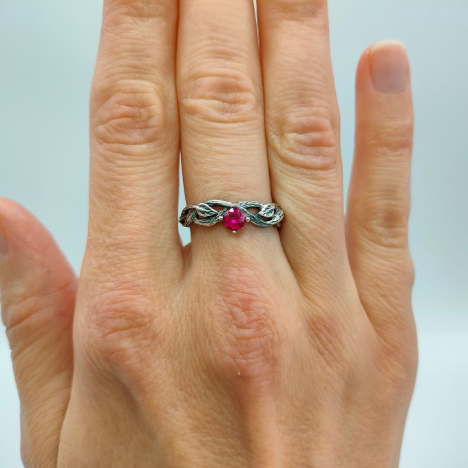 Scarlet Enchantment: Gothic Ruby Ring with Twisted Band