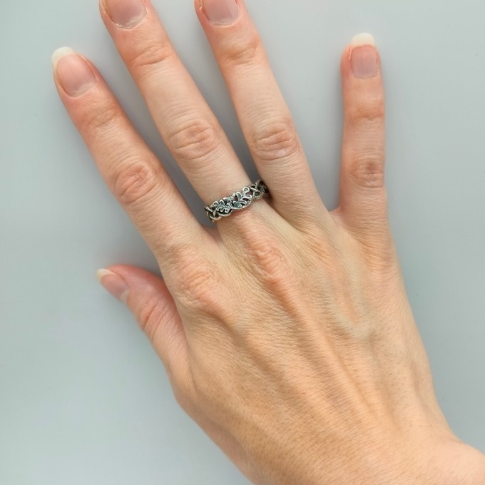 Labyrinth of Eternity: Gothic Sterling Silver Ring with Braided Motif