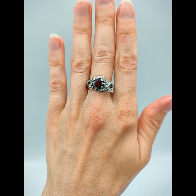Silver Ring with Dragon Claw and Garnet Design