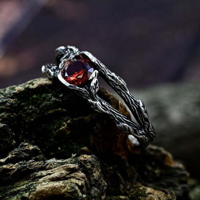 Fiery Gothic Ring with Garnet and Dark Claw Setting
