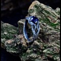 Ocean's Embrace: Gothic Sterling Silver Ring with a Deep Blue Sapphire
