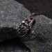 Gothic Silver Ring with Ruby-Studded Cross Design
