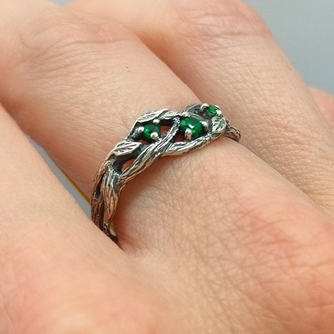 Silver Ring with Emeralds and Intricate Leaf Motif