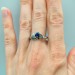 Silver Ring with Sapphire and Intricate Floral Design