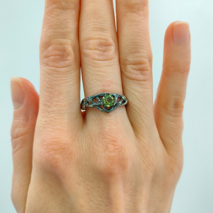Enchanted Gothic Peridot Ring with Leaf Motif