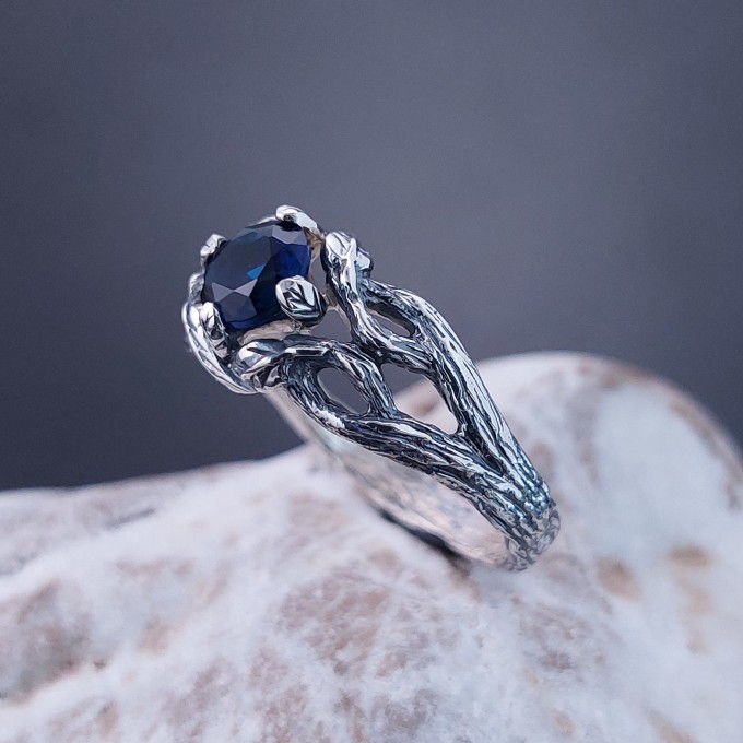 Intricate Silver Ring with Sapphire Gemstone