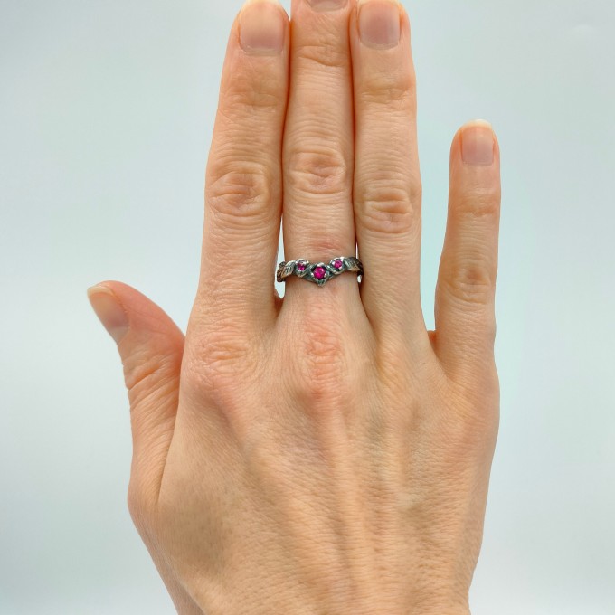 Gothic Ruby Ring with Intricate Twisting Design