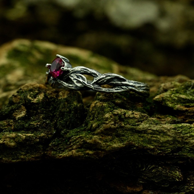 Scarlet Enchantment: Gothic Ruby Ring with Twisted Band