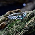 Whispers of the Forest: Sterling Silver Ring with Emerald Accents