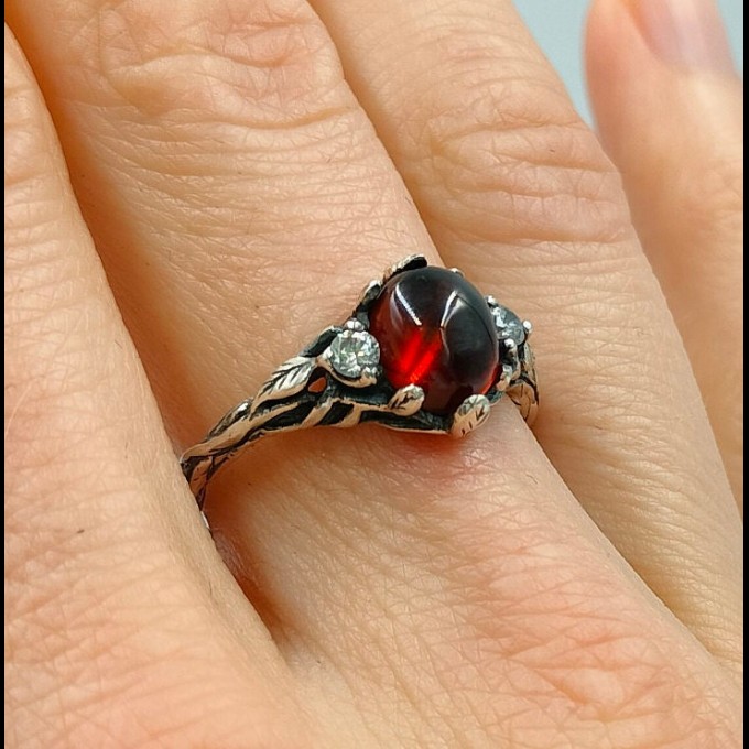 Handcrafted Silver Ring Featuring a Fiery Garnet