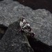 Garnet Gothic Skull Ring with Dark Intricacy