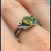 Gothic Silver Ring with a Vibrant Olivine Gemstone