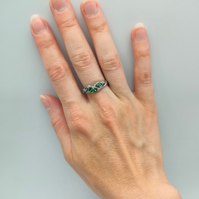 Silver Ring with Emeralds and Intricate Leaf Motif