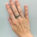 Silver Ring with Emeralds and Intricate Leaf Motif