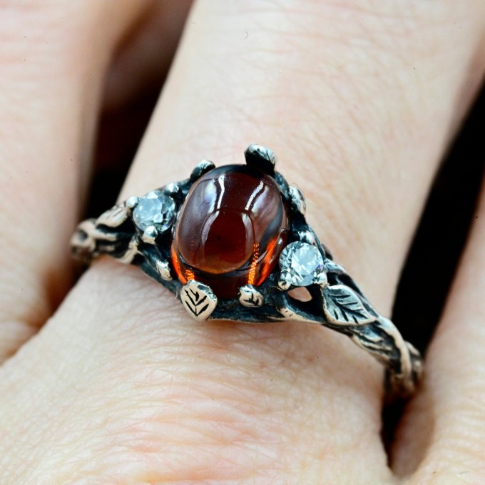 Silver Gothic Ring Featuring Intense Red Garnet
