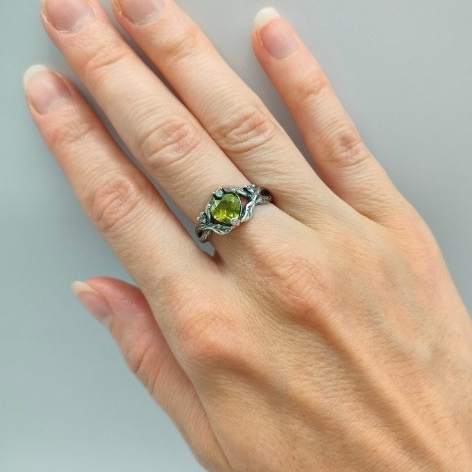 Gothic Silver Ring with a Vibrant Olivine Gemstone