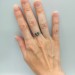 Gothic Silver Ring with Skull and Ruby Design