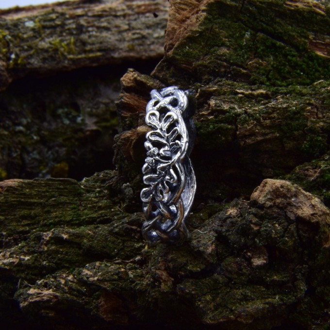 Labyrinth of Eternity: Gothic Sterling Silver Ring with Braided Motif