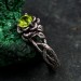 Elegant Peridot Lotus Ring - Nature-Inspired Silver Band with Leaf Detail