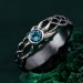 Waves of Serenity: Gothic Blue Topaz Ring