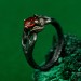Mystical Forest Ring with Garnet and Leafy Blossom Design